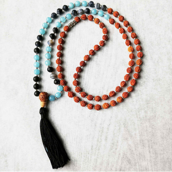 Rudraksha mala with blue agate and blue sponge combine for a beautiful mala to bring inner peace and focus.